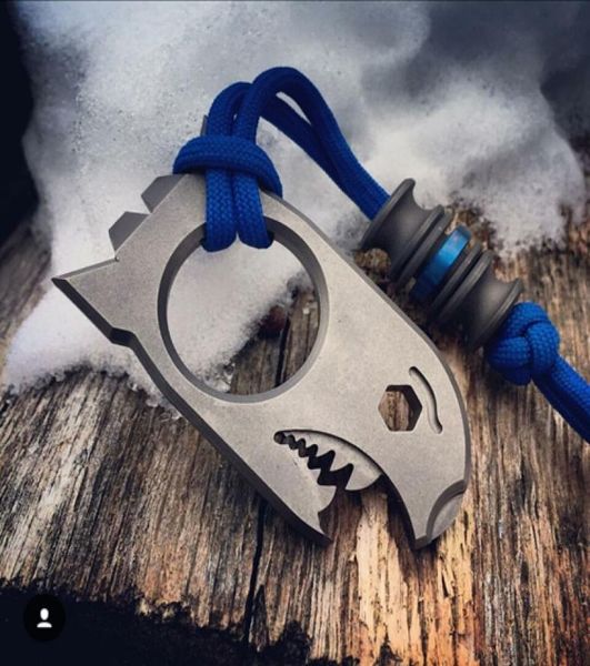 

titanium tc4 shark style bottle opener prybar knuckle duster 70mm x 35mm x 10mm edc tool stonewashed surface9729594