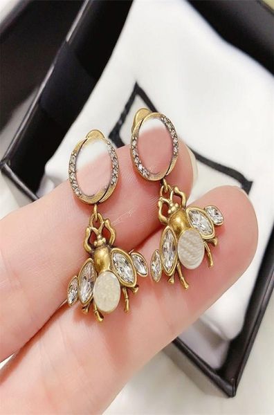 

stylish bee pearl charm earrings women diamond studs rhinestone double letter designer eardrop whole1728083, Golden