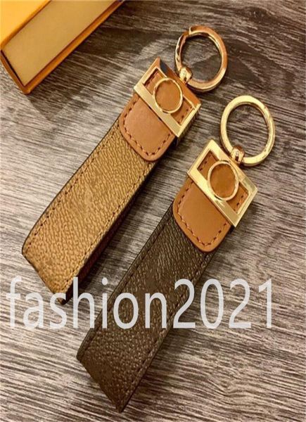 

2021 new luxury keychain men women bag hanging buckle keychains auto car waist handmade leather holder lover fashion keyring8901505, Silver