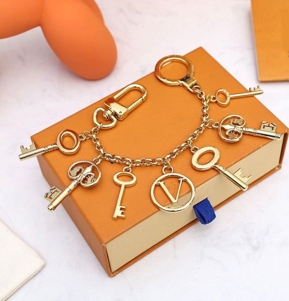 

keychain luxurys designers key chain men car keyring women buckle keychains bags pendant exquisite gift with box dust8381636, Silver
