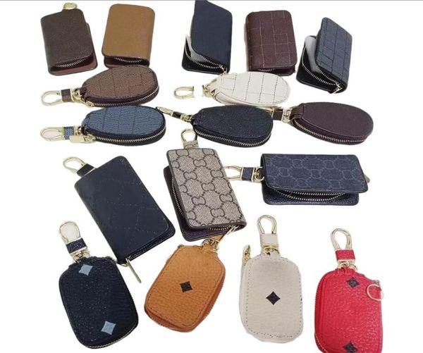 

fashion key buckle bag car keychain handmade luxury designer genuine leather keychains men women coin purse bags pendant 18 colors8191042, Silver