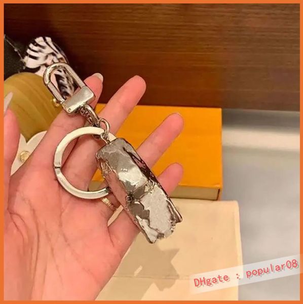 

fashion key holder keychain car new luxurys designers portachiavi keyring cato gram llavero porte cles bag charm 2105189y4199817, Silver