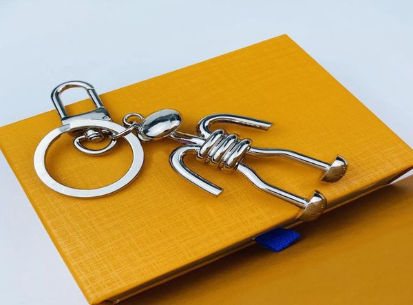 

mens luxurys designers womens key chain fashion astronaut alien keys chains necessary for going out exquisite appearance gift 7327899, Silver