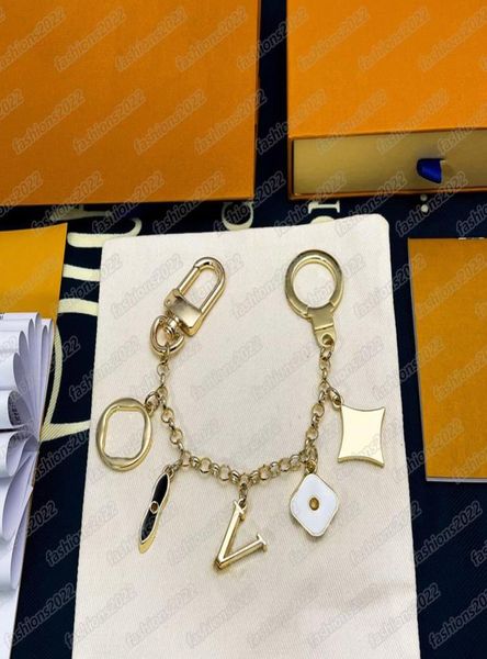 

designer keychains fashion bags car key chain flowers design accessories men women decoration 5 styles4450108, Silver