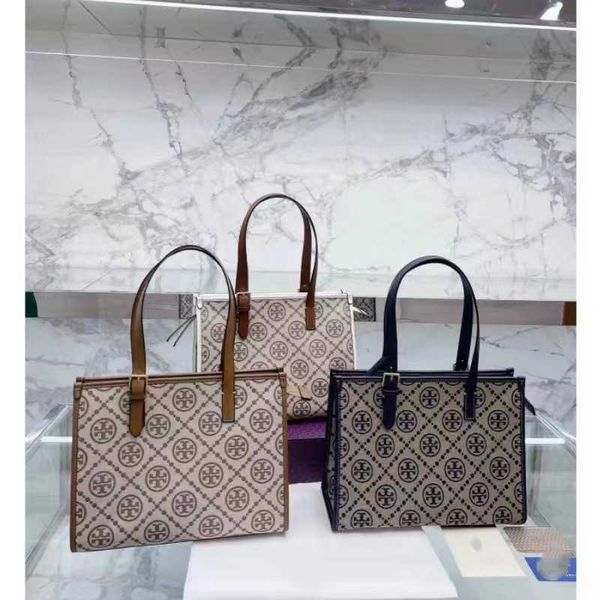

luxury torysburchs designer leather handbags spring 2023 new tb old flower tote handheld single shoulder crossbody water bucket bag d