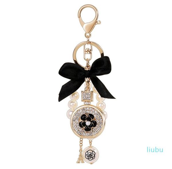 

lovely cute bow pearl flower perfume bottle keychains new fashion ins luxury designer diamond rhinestone bag charm6832740, Silver