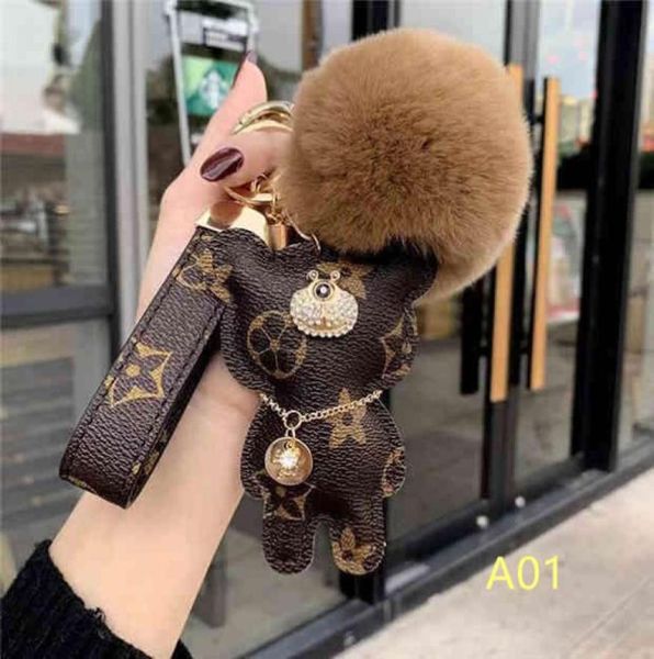 

2021 fashion brand dog keychain classic chic keyring women men luxury car pendant designer key chain trinket jewelry aaaa111117434, Silver