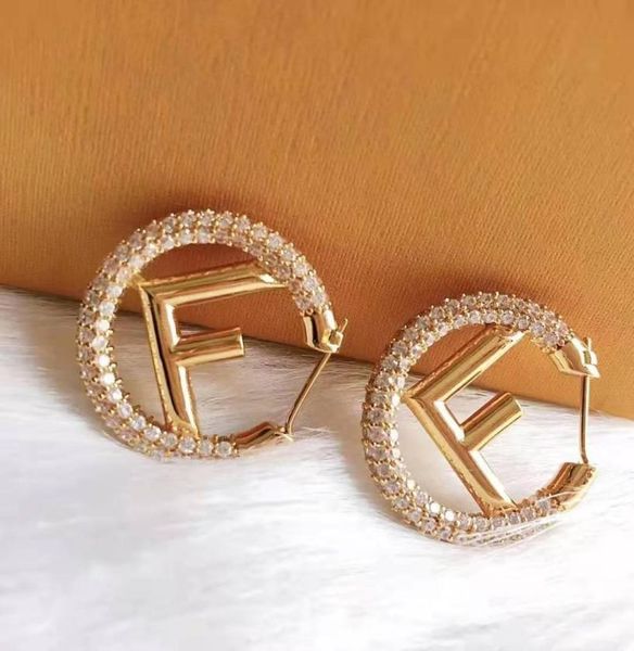 

european and american luxury custom designer earrings s925 silver needle autumn and winter new full diamond letters2193349, Golden