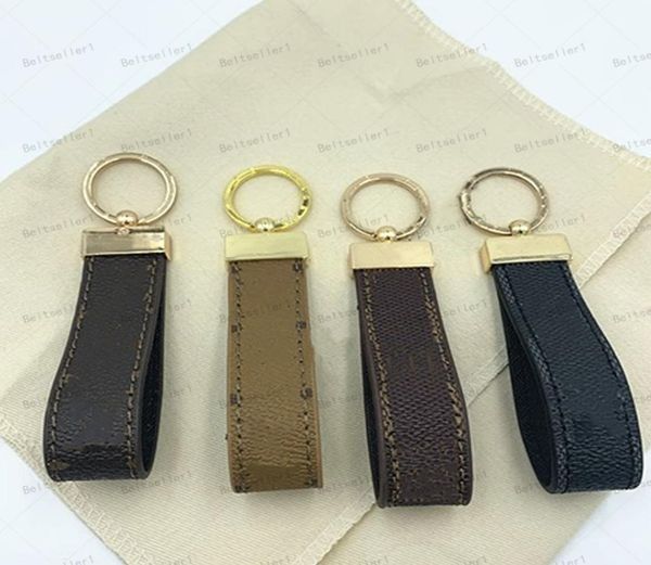 

2021 whole 14 color key chains letters true leather car fashion k sling with boxes3535657, Silver