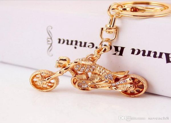 

gold tone skull motorcycle keychain rhinestone rider key chains ring holder mens car luxury keychains womens purse bag charm9604716, Silver