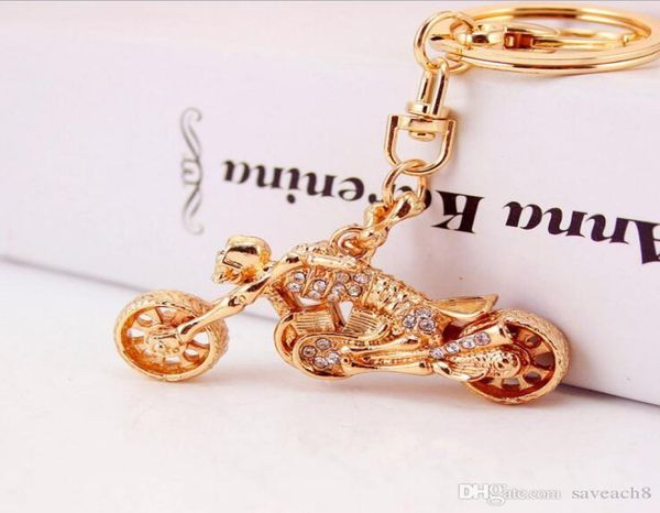 

gold tone skull motorcycle keychain rhinestone rider key chains ring holder mens car luxury keychains womens purse bag charm3848664, Silver