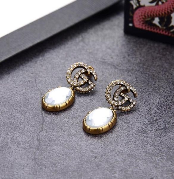 

fashionable atmosphere white diamond red diamond earrings019718431, Golden;silver