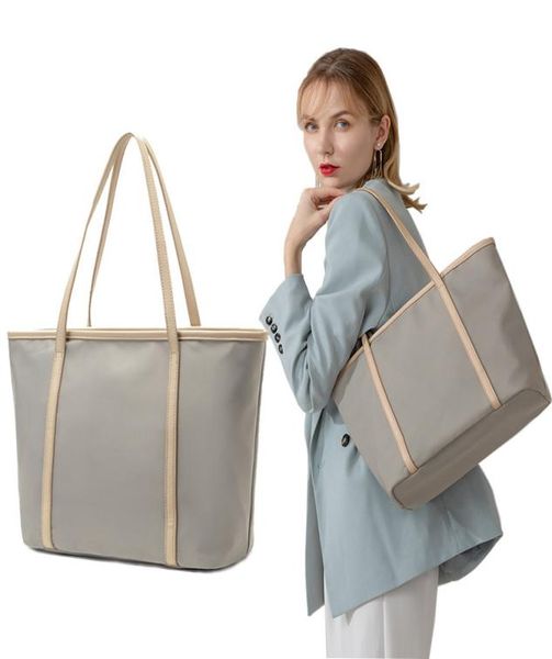

2021 bag women039s luxurys new stote fashion multi service single shoulder portable large capacity nylon oxford canvas7842503