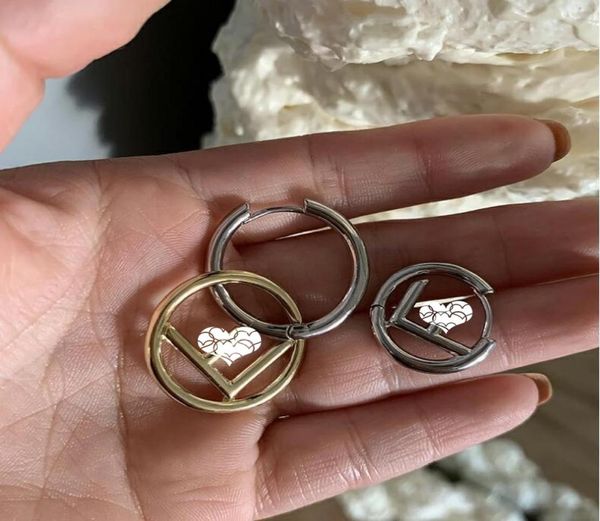 

2021 european and american new geometric golden fashion earrings letter hollow round earrings personality asymmetric earrings3199176, Silver