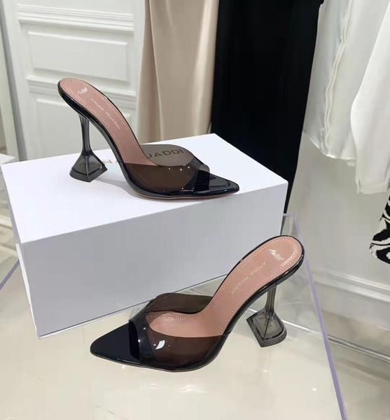 

amina muaddi fashion season shoes slippers italy mules awge caroline black pvc sandals umo4040339