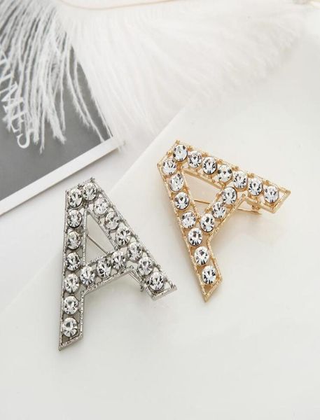 

new men women fashion full rhinestone letters pins brooches goldsilver plated letters bling bling brooches pins for party wedding7374598, Gray