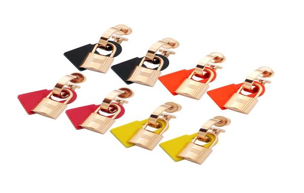 

europe america simple style lady women titanium steel tassels engraved h initials rubber and metal lock stud earrings 3 color1693520, Golden;silver
