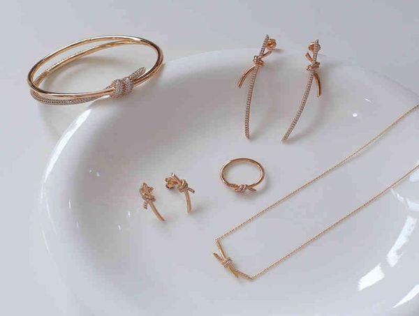 

custom rose gold diamond bow knot light luxury high sense simple knot necklace earrings 925 silver bracelet ring7513743, Golden