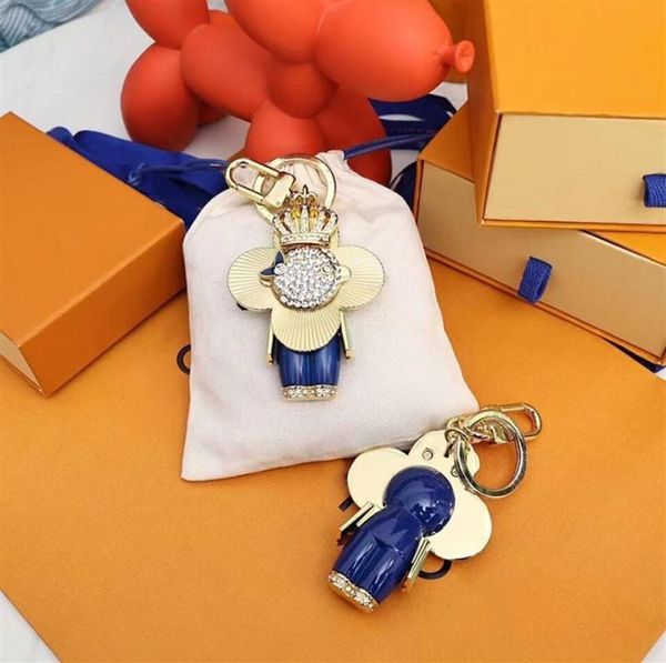 

luxury designers keychain car key chain monogrammed keychains genuine metallic cartoon humanoid design men women bag pendant acces7073259, Silver