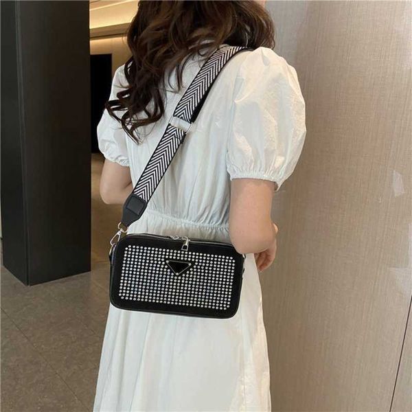 

2024 new luxury handbag factory direct sales diamond camera summer new popular on the internet for women shoulder broadband niche diagonal b