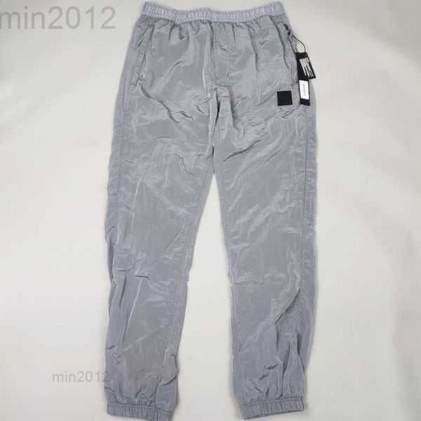 

brand designers pants stone metal nylon pocket embroidered badge casual trousers thin reflective island sizef794, Black