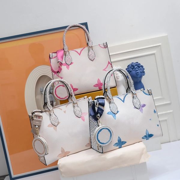 

2023ss women luxurys designers totes bags quality onthego handbag crossbody bag genuine leather messenger ladies travel handbags 33cm