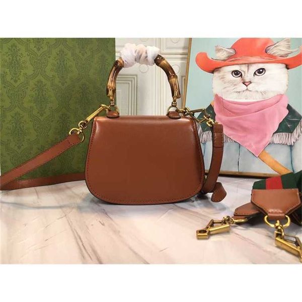 

luxury handbags designers evening bag new cowhide bamboo knot handle cross button saddles handheld one shoulder crossbody double mini purse