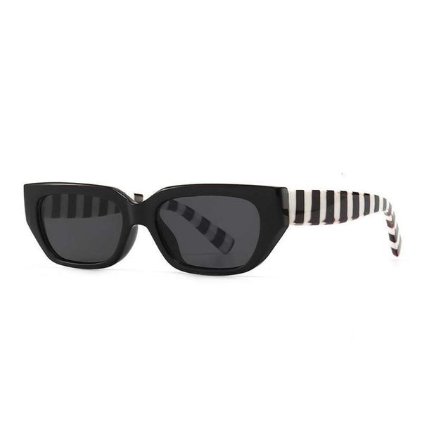 

modern retro narrow jelly colored sunglasses cat eye model catwalk woman, White;black