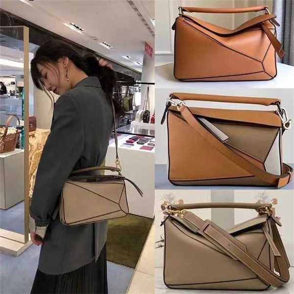 

luojia bag 2023 new genuine leather geometric mini handheld one shoulder oblique cross pillow temperament casual women's