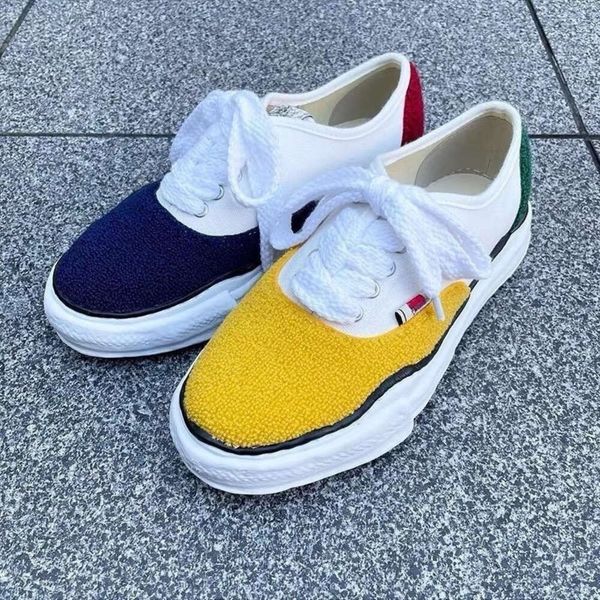 

co branded maison mihara yasuhiro dissolved shoes mmy men's and women's canvas shoes thick sole low classic pure black and white b