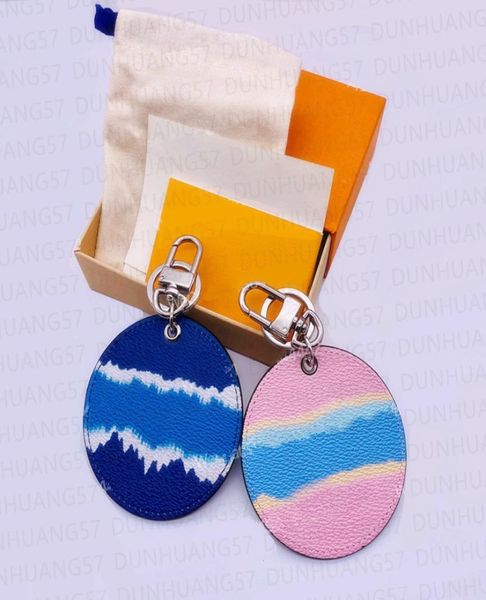 

luxury keychains pendant designer round fashion pendant classic blue water ripple letter pattern leather keychain bag hanging buck7519559, Silver