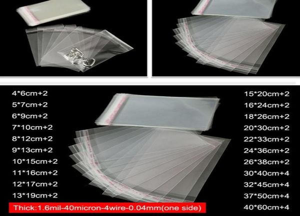 

100pcs thicken clear selfadhesive cellophane bag self sealing small plastic bags packing resealable jewelry packaging pouch3726534, Pink;blue