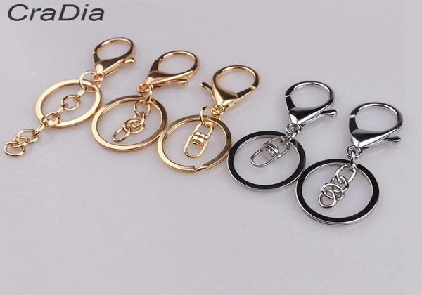 

100pcs set 30mm 12designs key chains key rings round golden silver color lobster clasp keychain t2008049984853