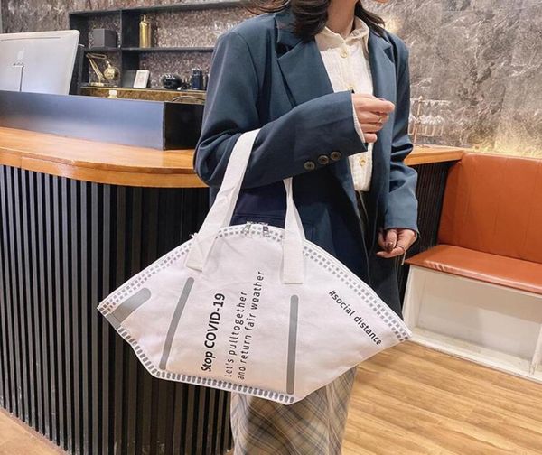

2021 winter new personality mask shape tote bag creative largecapacity fashion shopping shoulder bag gc381302333
