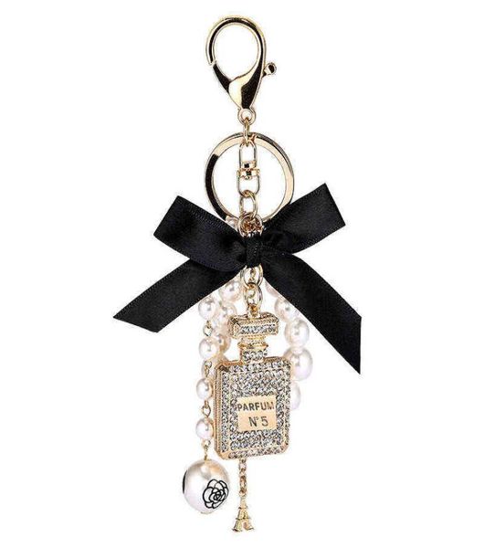 

2022 imitation pearl perfume bottle keychain car key ring holder bag charm pendant accessories bow key chain fashion keyring aa2209573969, Silver