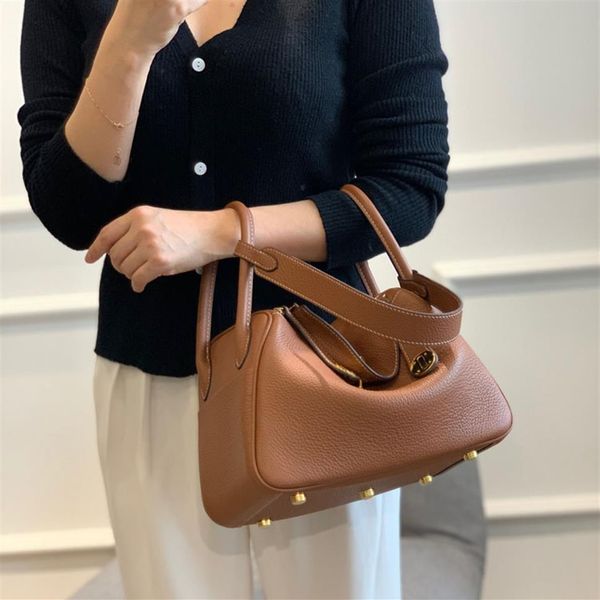 

high-end customized autumn and winter caramel color first layer cowhide medicine bag shoulder underarm womens handbag2379