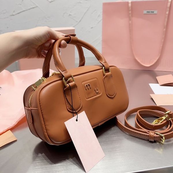 

designer bag the tote bag shoulder bag woman metal lettering logo solid color zipper open and close soft sheep leather shoulder crossbody ba