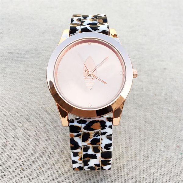 

brand watches women men clover 3 leaves leaf style silicone strap analog quartz wrist watch ad14294g, Slivery;brown
