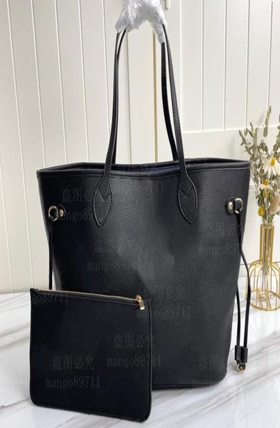 

woman shopping bag handbag purse tote leather fashion shoulder blue lining serial number date code2768639