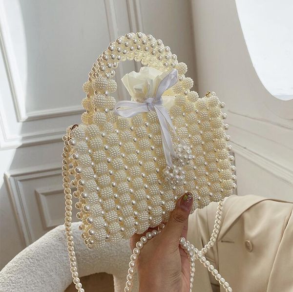 

Factory wholesale women shoulder bag small design beaded woven handbag Western style hollowed out Tote bag small fresh and sweet pearl handbags 10512#, Multi