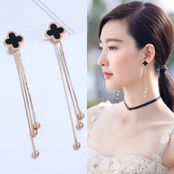 

Designer earrings four-leaf Clover luxury top jewelry long Earrings trendy temperament Roman digital tassel earrings light luxury high-end Jewelry gift Van Clee