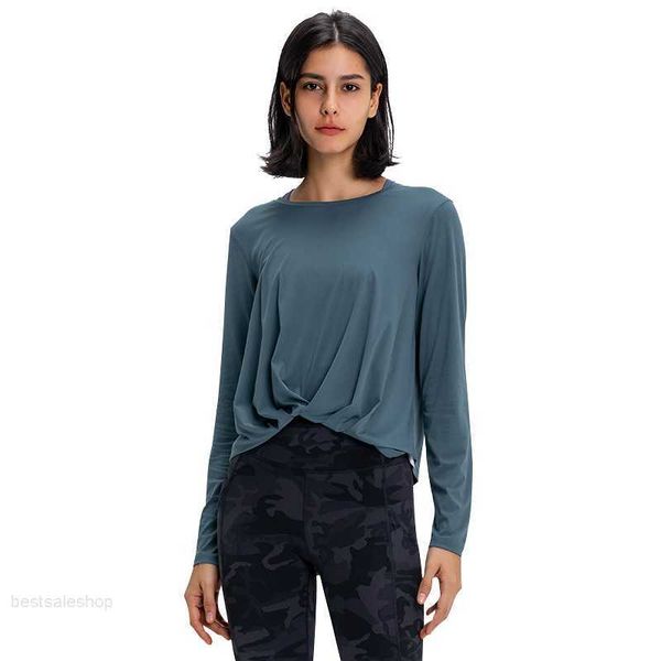 

womenport long sleeved gym flowing tee moisture wicking athletic nakedfeel fabric hem tshirt top