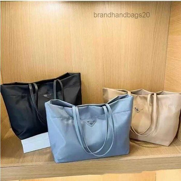 

wholesale p luxury designer brands shopping bags women triangle label waterproof leisure travel bag large capacity nylon mommy tote ladies b