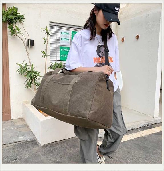 

canvas super capacity travel bag men and women's luggage leisure moving storage