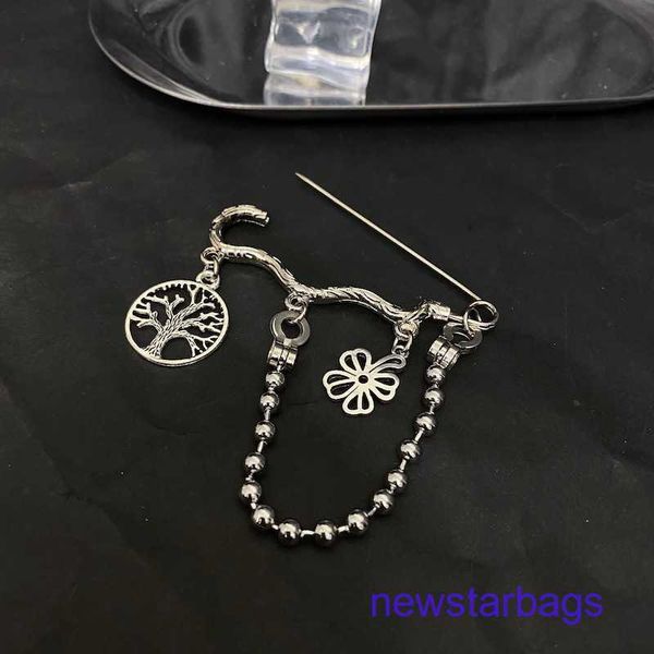 

factory outlet wholesale brooches tree of life four leaf grass style hip hop cool jewelry titanium steel chain pin brooch suit shoe, Gray
