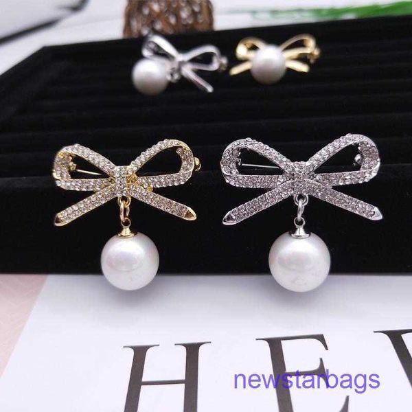 

factory outlet wholesale brooches pearl anti stray bow tie diamond rhinestone smooth pin buckle clothing accessories, Gray