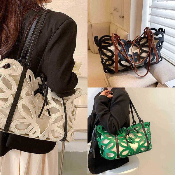 

large capacity one shoulder women s bag summer niche all match hollow child mother tote bag 2205010