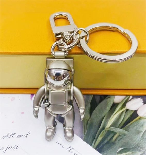 

famous spaceman keychains fashion designer key chains accessory men and women pendant box packaging car chain accessories6486485, Silver