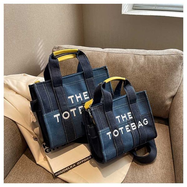 

new denim contrast color splicing portable tote high-grade feeling small embroidered letter messenger bag 75% off online sales