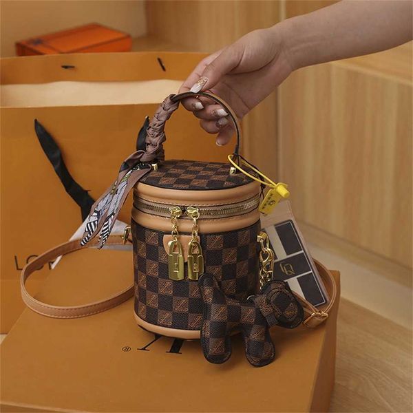 

new fashion ocean air one shoulder cross body bucket high-grade cylindrical printed square hand cylinder bag 75% off online sales